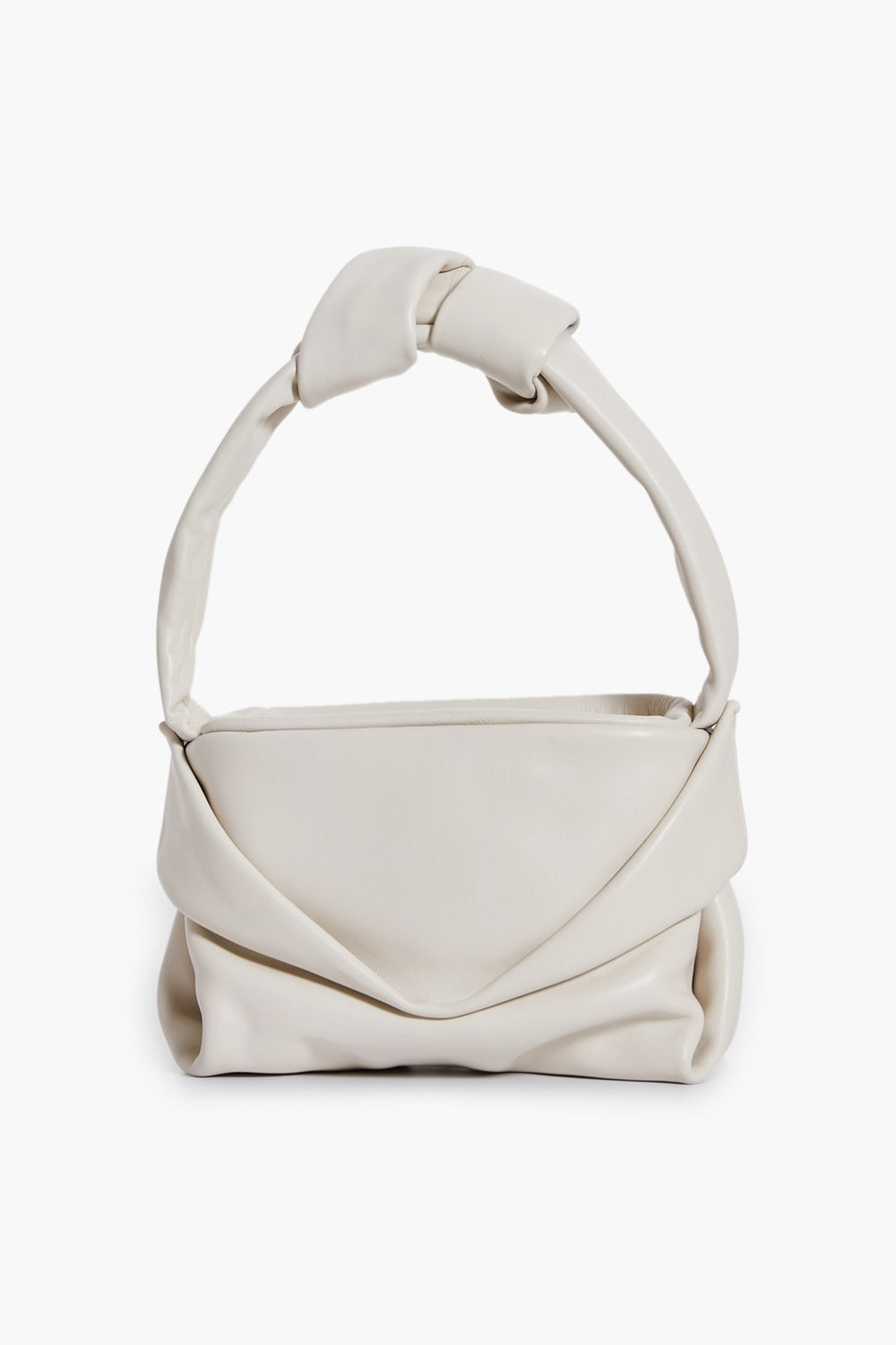 A cream lamb handbag by STAUD with a soft, folded design and thick knotted handle, reminiscent of the Cream Kiss Bag.