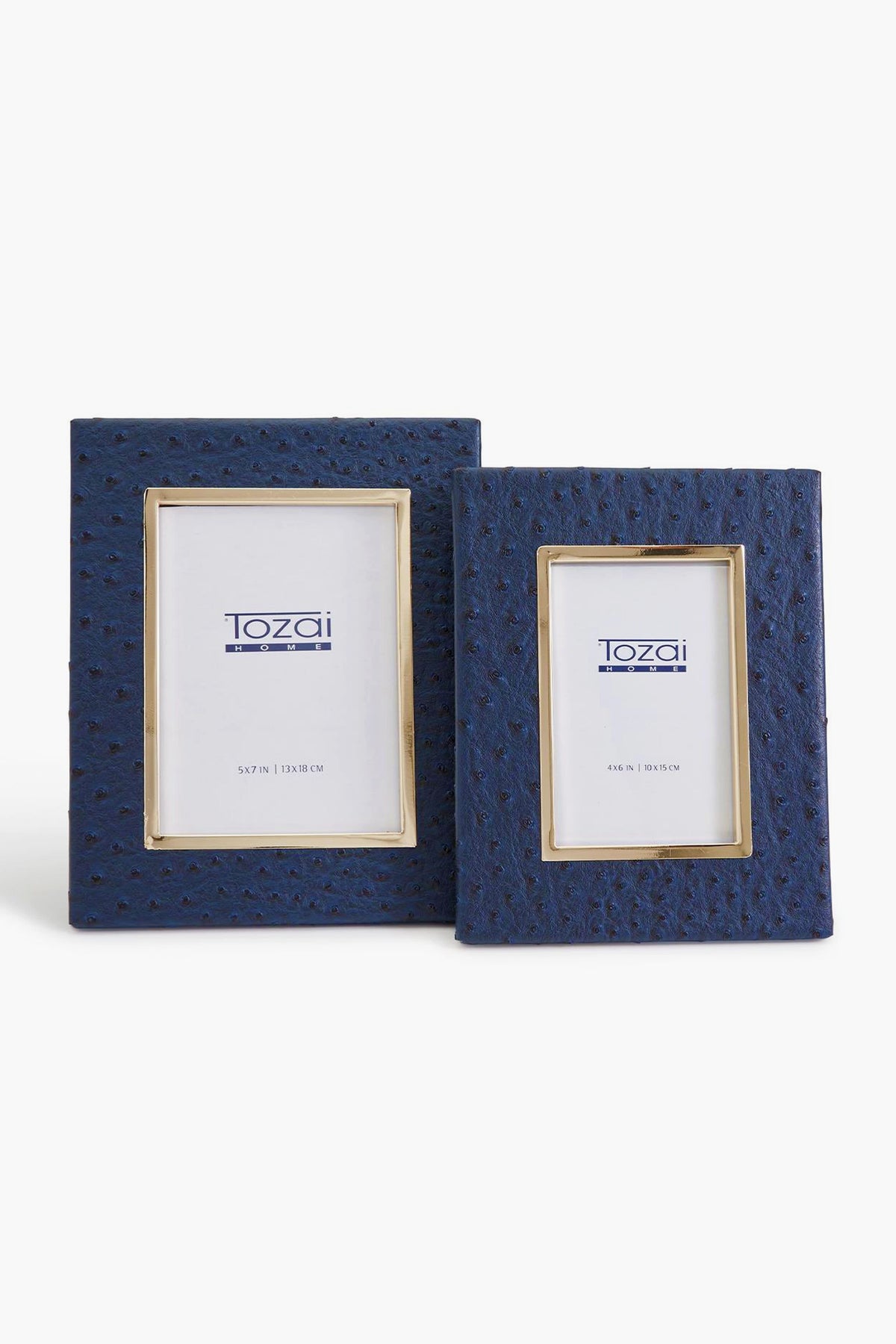 Two blue textured photo frames by Two's Company—a large and a small—are displayed side by side. Each features an ostrich pattern vegan leather finish and comes with branded placeholder paper.