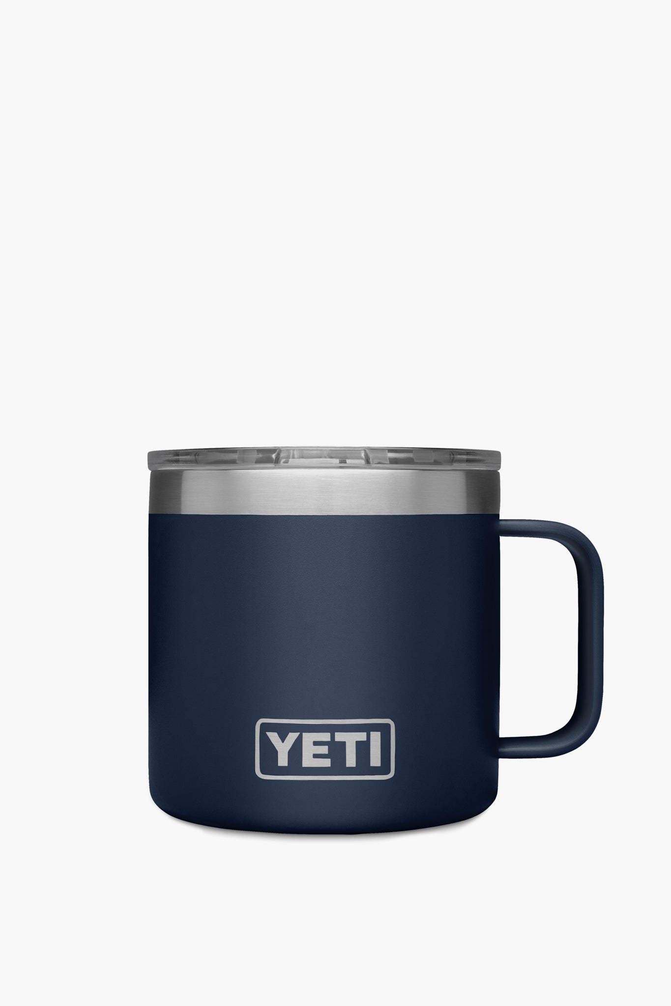 A navy blue YETI Rambler mug with a handle and clear lid, made from stainless steel and vacuum insulated to keep drinks hot or cold.