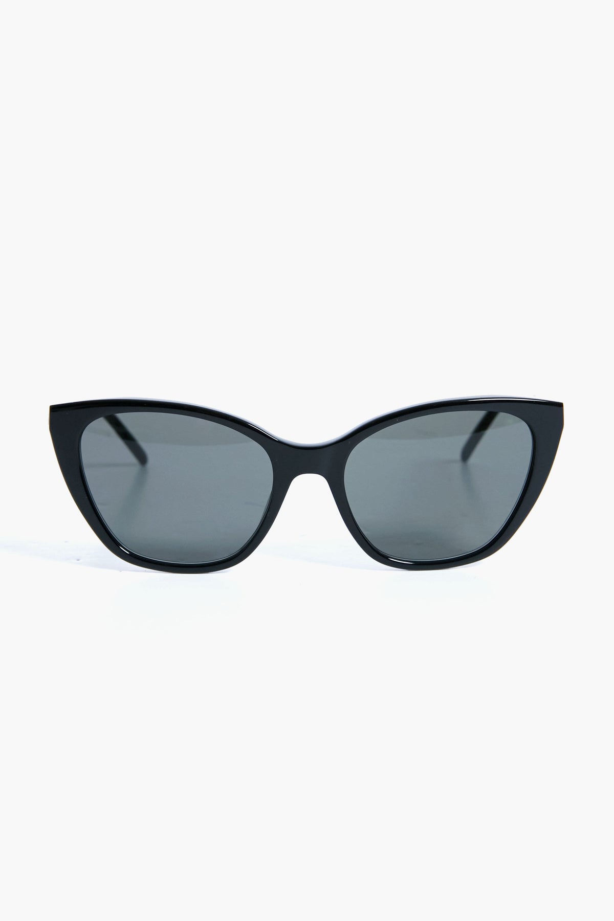 A pair of black cat eye sunglasses by Saint Laurent, featuring dark tinted lenses and a classic, stylish shape.