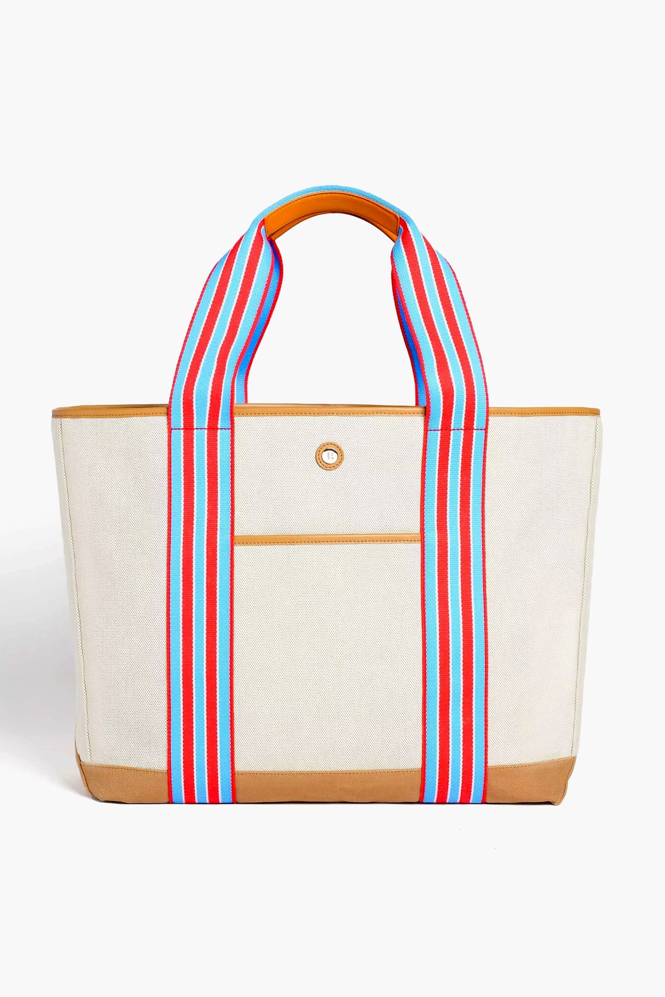 Paravel's beige canvas tote has tan trim, multicolored striped handles (red, blue, white), an exterior pocket, and a button detail. Water-resistant and made from recycled materials, it’s a sustainable choice for travel.
