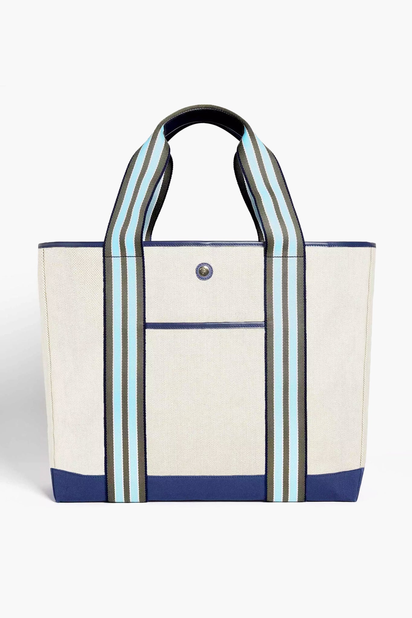 The Paravel tote is a beige canvas bag crafted from recycled materials, featuring blue accents, wide blue/black/white striped handles, a front pocket, and a snap closure.