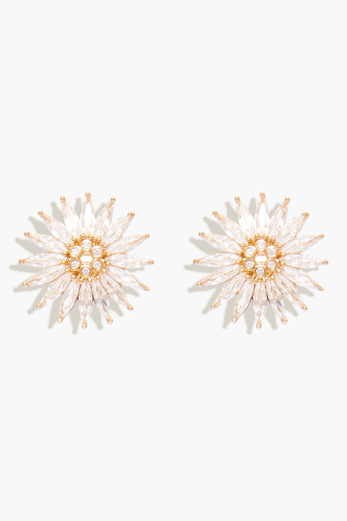 A pair of Mignonne Gavigan gold-plated Crystal Madeline Studs featuring radiating petal-like crystals and clustered round stones at the center.