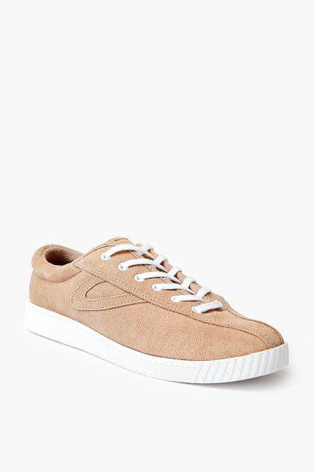 Tan suede luxury sports shoe with white laces and a white rubber sole, showcasing the classic Tretorn style.
